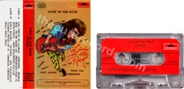 V.A. - Livin' in the Rock (issued 1987). 12 tracks. Includes "Boys don't cry". - Thanks to Strunz4.