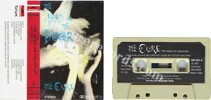 The head on the door (issued 1985). Found in either clear tape or PolyGram beige plastic tape, both with black label. - Thanks to delma