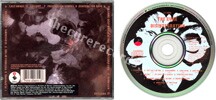 Disintegration (issued 1989). White flower. Logo on backsleeve and rear side of booklet is circled in white. - Thanks to rafacure