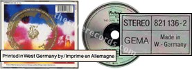 The top (issued 1990). Silver disc and silver inner ring. Note misspelt "Snake dog snake". Matrix says "821 136-2  01 # YD" and "MADE IN GERMANY". - Thanks to rafacure